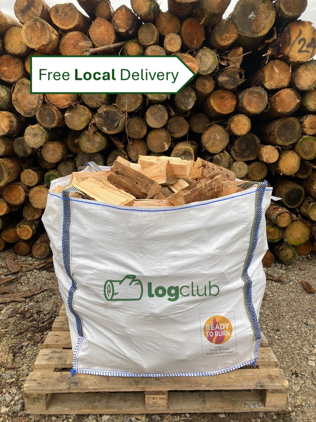 Bag of firewood with 'Logclub' branding in front of stacked logs, featuring 'Free Local Delivery' text.